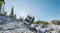 Rugged portable power station on mountain rocks, designed for reliable off-grid energy and camping use Rugged portable power station on mountain rocks, designed for reliable off-grid energy and camping use