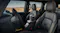 Car interior featuring a portable power station for charging electronics on long-distance journeys Car interior featuring a portable power station for charging electronics on long-distance journeys
