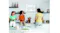 Bright kitchen featuring wall-mounted digital calendar with family Bright kitchen featuring wall-mounted digital calendar with family