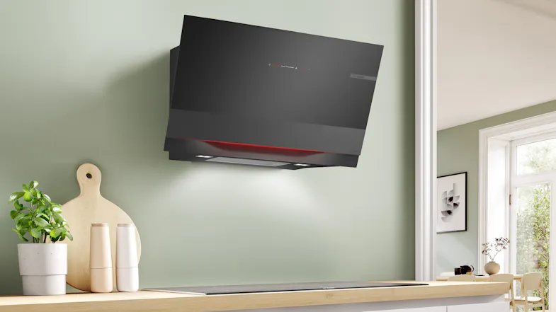 Bosch Series 8 90cm silent wall-mounted rangehood displayed in a stylish kitchen setting Bosch Series 8 90cm silent wall-mounted rangehood displayed in a stylish kitchen setting