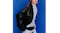 Person wearing a black leather jacket showcasing the Bose QuietComfort headphones Person wearing a black leather jacket showcasing the Bose QuietComfort headphones