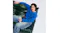 Man on sofa with laptop showcasing Bose headphones on head Man on sofa with laptop showcasing Bose headphones on head