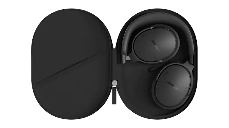 An open hard case showcasing folded headphones stored inside An open hard case showcasing folded headphones stored inside