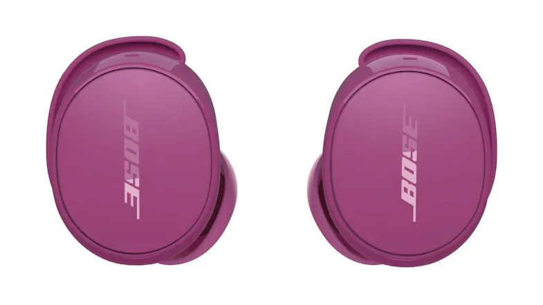 Front-facing close-up of both Bose QuietComfort earbuds, showcasing the smooth outer surfaces Front-facing close-up of both Bose QuietComfort earbuds, showcasing the smooth outer surfaces