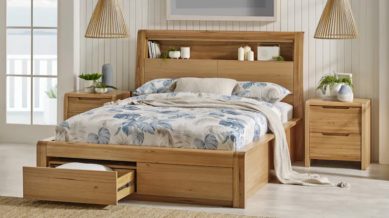 Front view of a wooden bed frame featuring built-in headboard shelves Front view of a wooden bed frame featuring built-in headboard shelves