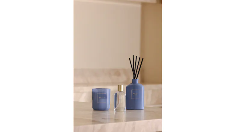 A view of the Moss St. room fragrance, scented candle, and reed diffuser products A view of the Moss St. room fragrance, scented candle, and reed diffuser products