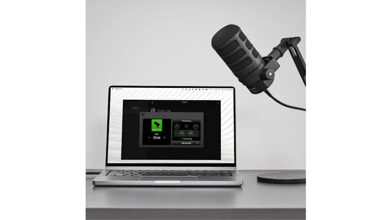 Studio setup showcasing the RODE PodMic beside an open laptop Studio setup showcasing the RODE PodMic beside an open laptop