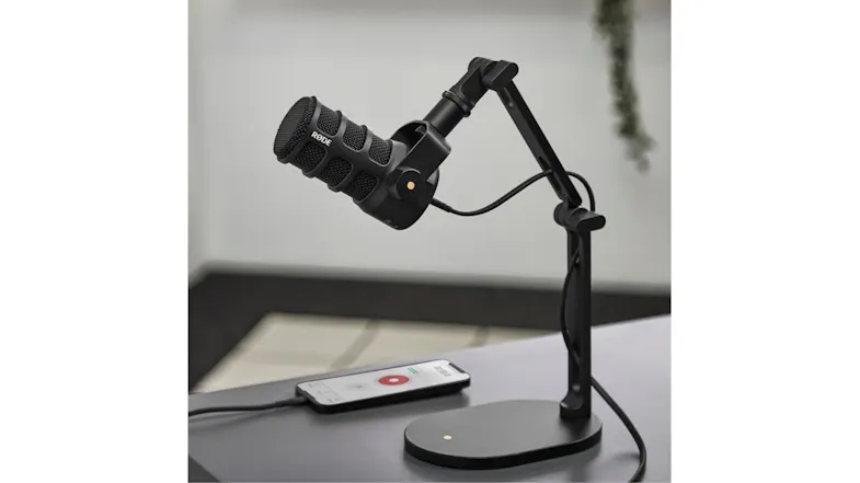 Desk setup featuring the microphone mounted on an adjustable stand Desk setup featuring the microphone mounted on an adjustable stand