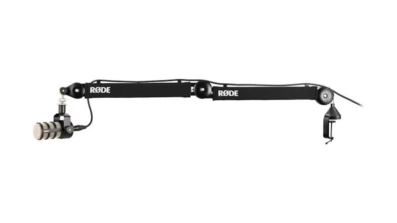 Side view showcasing a horizontally extended boom arm with a microphone Side view showcasing a horizontally extended boom arm with a microphone