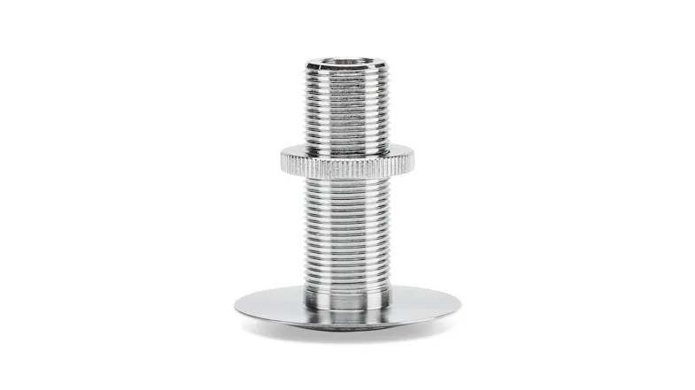 Close-up view showing a silver metal threaded mount insert Close-up view showing a silver metal threaded mount insert