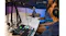 Podcast setup featuring a boom arm and microphone with two hosts Podcast setup featuring a boom arm and microphone with two hosts