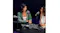 Two podcast hosts talking with microphones and the console on a table Two podcast hosts talking with microphones and the console on a table