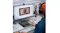 Person using the audio console during a video call on a desktop screen Person using the audio console during a video call on a desktop screen