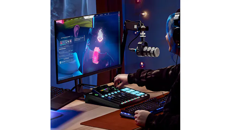 Creator managing audio controls during a gaming stream setup Creator managing audio controls during a gaming stream setup