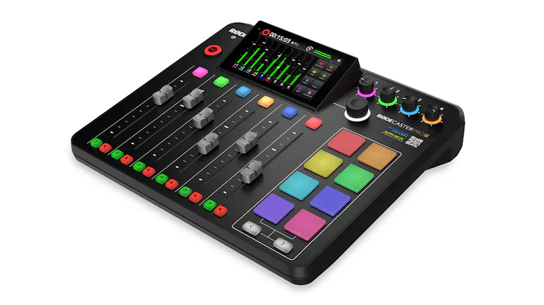 Three-quarter view of the studio console showing faders and illuminated sound pads Three-quarter view of the studio console showing faders and illuminated sound pads