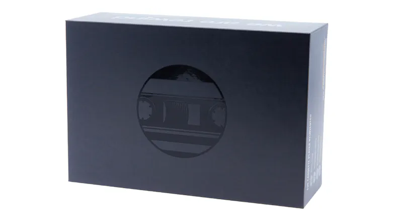 Front view of the product packaging box featuring a circular display window and minimalist black design Front view of the product packaging box featuring a circular display window and minimalist black design