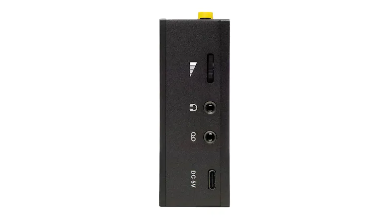 Side profile of the cassette player showing input/output ports, controls, and connectivity options Side profile of the cassette player showing input/output ports, controls, and connectivity options