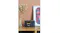 Wide lifestyle shot of the grey Bluetooth cassette player displayed on a shelf with decorative accessories Wide lifestyle shot of the grey Bluetooth cassette player displayed on a shelf with decorative accessories