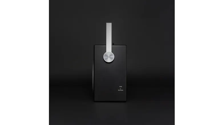 Side profile of the boombox, highlighting its slim design and integrated carrying handle Side profile of the boombox, highlighting its slim design and integrated carrying handle