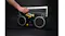 Hand inserting or removing a cassette tape from the boombox, illustrating playback and recording functionality Hand inserting or removing a cassette tape from the boombox, illustrating playback and recording functionality