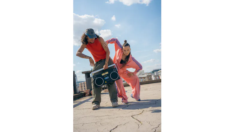 We Are Rewind Blaster Curtis portable boombox carried outdoors on a paved urban surface We Are Rewind Blaster Curtis portable boombox carried outdoors on a paved urban surface