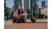 Blaster Curtis cassette boombox placed on an outdoor court next to a basketball, showcasing retro style Blaster Curtis cassette boombox placed on an outdoor court next to a basketball, showcasing retro style