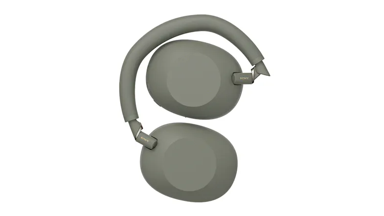 Overhead view of WH-1000XM6 olive gray headphones folded compact Overhead view of WH-1000XM6 olive gray headphones folded compact