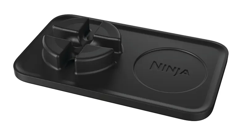 Black Ninja Luxe Cafe tamping mat with a portafilter cutout and logo Black Ninja Luxe Cafe tamping mat with a portafilter cutout and logo