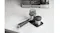 Ninja portafilter with dosing funnel and tamper neatly stored on a black tamping mat Ninja portafilter with dosing funnel and tamper neatly stored on a black tamping mat