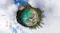 360-degree tiny planet perspective of a turquoise mountain lake surrounded by evergreen trees and clouds 360-degree tiny planet perspective of a turquoise mountain lake surrounded by evergreen trees and clouds