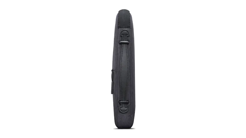 Side view of a charcoal grey laptop sleeve showing a built-in carrying handle and slim, padded design Side view of a charcoal grey laptop sleeve showing a built-in carrying handle and slim, padded design