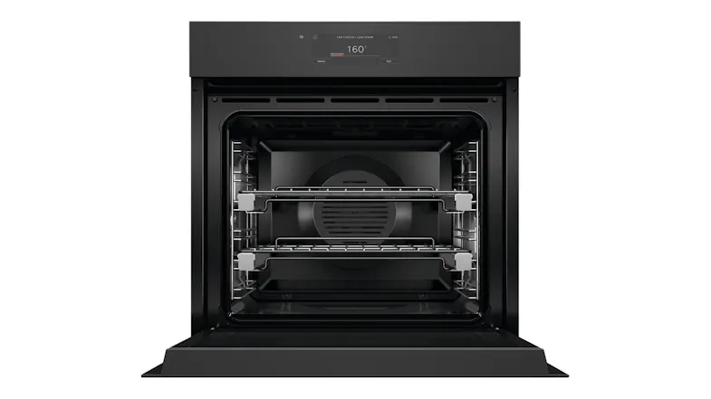 An open black Fisher & Paykel wall oven revealing a dark interior with two empty metal wire racks An open black Fisher & Paykel wall oven revealing a dark interior with two empty metal wire racks