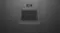 A front view of a dark grey, built-in Fisher & Paykel oven with the door closed and integrated clock display A front view of a dark grey, built-in Fisher & Paykel oven with the door closed and integrated clock display