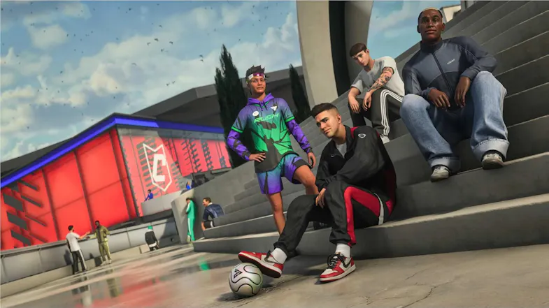 Street soccer scene featuring players seated together on concrete steps Street soccer scene featuring players seated together on concrete steps