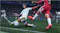 Game scene highlighting two players competing for a soccer ball Game scene highlighting two players competing for a soccer ball