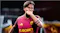 Close-up view of a soccer player gesturing with a finger to his face Close-up view of a soccer player gesturing with a finger to his face