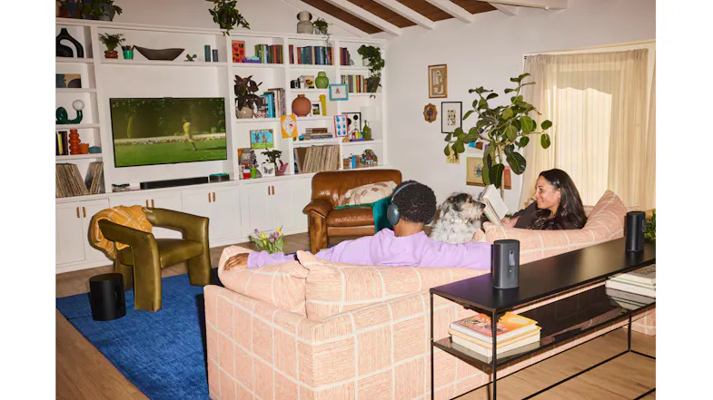 Wide-angle view of a modern living room featuring the Sonos Beam Ultra soundbar integrated into a television setup Wide-angle view of a modern living room featuring the Sonos Beam Ultra soundbar integrated into a television setup
