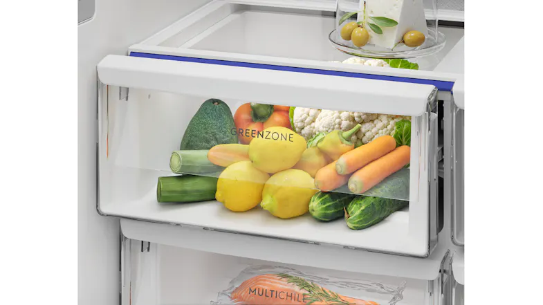 Interior drawer view of the fridge freezer showcasing fresh produce stored inside Interior drawer view of the fridge freezer showcasing fresh produce stored inside