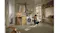 A man operating the Miele washing machine in a modern laundry room A man operating the Miele washing machine in a modern laundry room
