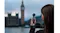Evening view of a woman holding the gimbal camera outdoors Evening view of a woman holding the gimbal camera outdoors