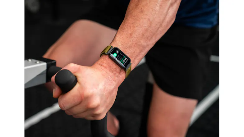 Detailed view of the smartwatch worn during a workout, with the touchscreen display visible Detailed view of the smartwatch worn during a workout, with the touchscreen display visible