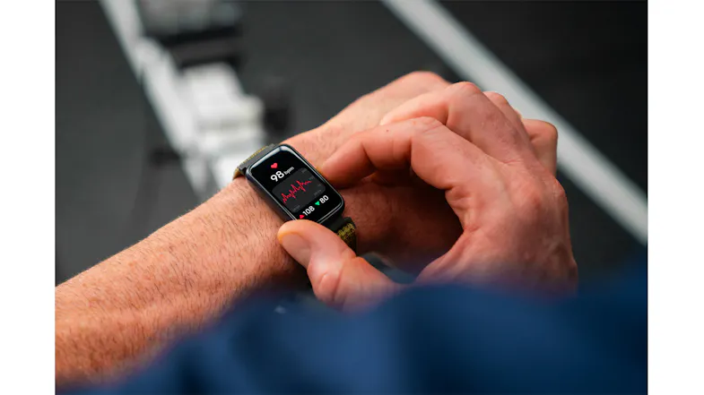 Person adjusting the Ryze Elevate (Gen 2) SmartWatch on their wrist during exercise Person adjusting the Ryze Elevate (Gen 2) SmartWatch on their wrist during exercise