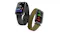 Two smartwatches displayed together, showcasing interchangeable black silicone and olive woven bands Two smartwatches displayed together, showcasing interchangeable black silicone and olive woven bands