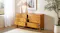 Six-drawer wooden dresser with warm finish and brass-look handles, shown with multiple drawers open Six-drawer wooden dresser with warm finish and brass-look handles, shown with multiple drawers open