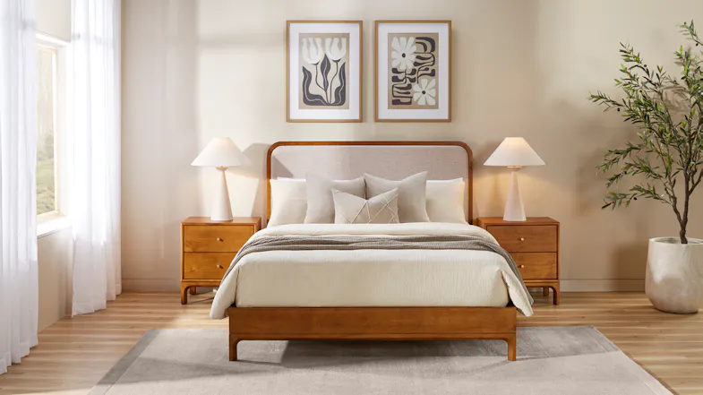 Mid-century wooden bed frame with upholstered headboard and matching two-drawer bedside tables, front room view Mid-century wooden bed frame with upholstered headboard and matching two-drawer bedside tables, front room view