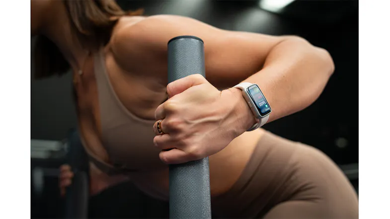 Close-up of the smartwatch worn during exercise, highlighting the touchscreen display and fitness monitoring Close-up of the smartwatch worn during exercise, highlighting the touchscreen display and fitness monitoring