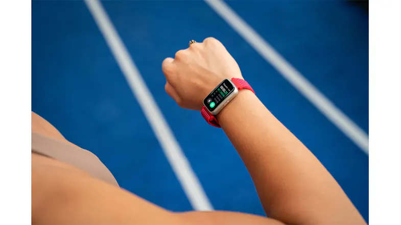 Close-up of the Ryze Elevate (Gen 2) SmartWatch with a cream case and red woven band worn during exercise Close-up of the Ryze Elevate (Gen 2) SmartWatch with a cream case and red woven band worn during exercise