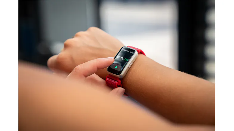 Person interacting with the Ryze Elevate (Gen 2) SmartWatch on their wrist during a fitness session Person interacting with the Ryze Elevate (Gen 2) SmartWatch on their wrist during a fitness session