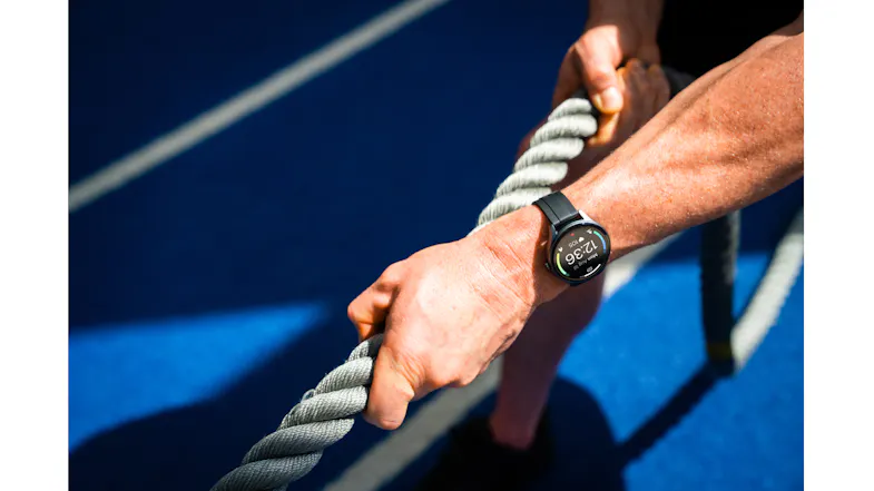 Close-up of the Flex (Gen 2) SmartWatch worn during a battle rope workout Close-up of the Flex (Gen 2) SmartWatch worn during a battle rope workout