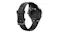 Rear angled view of the smartwatch, highlighting the optical sensor array and charging contacts on the underside Rear angled view of the smartwatch, highlighting the optical sensor array and charging contacts on the underside